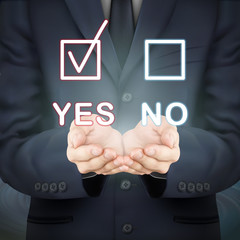 businessman holding evaluation checkbox