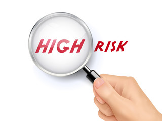 high risk showing through magnifying glass