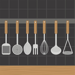 Kitchen utensils weighs on a wall in the kitchen.