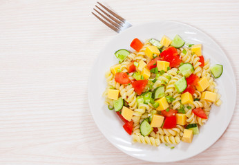 pasta salad with cheese and vegetables