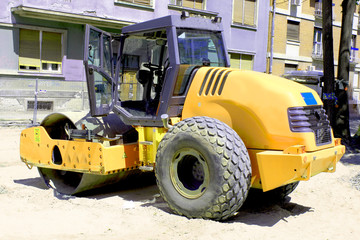 roller machine finishing the road