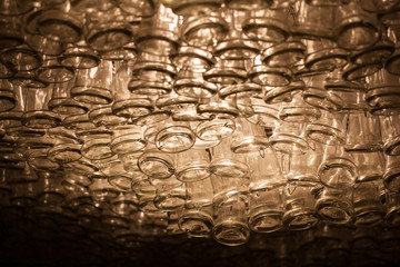 empty wine bottles hanging