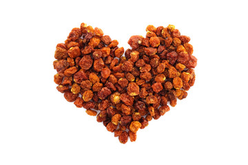 Dried goldenberries in a heart shape