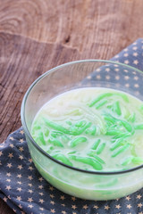 Thai food, Lod Chong dessert coconut milk on wood table