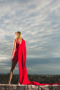 Young Woman Posing As Superhero Or Wonderwoman