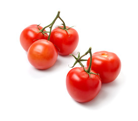 Fresh red tomatos isolated on white background