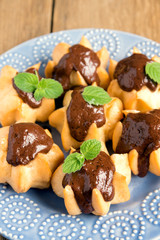 Profiteroles with chocolate sauce