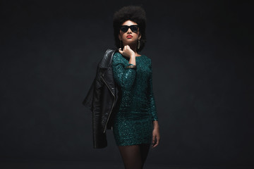 Stylish Afro Woman Holding her Jacket over the Shoulder