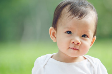 Portrait of an adorable baby girl (soft focus on the eyes)