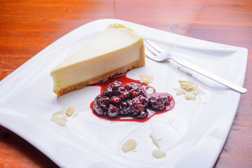 Cheesecake with fruit and almonds