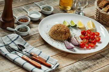 Pate and cherry tomatoes with spices, bread and wine