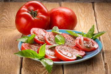 Tomatoes with basil