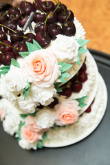 A beautiful wedding cake with roses.