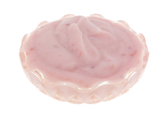 Glass bowl filled with strawberry yogurt
