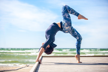 woman practicing yoga