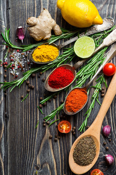 Spices over wooden background