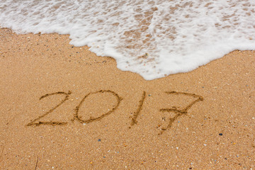 Inscription on a sand 2017. 