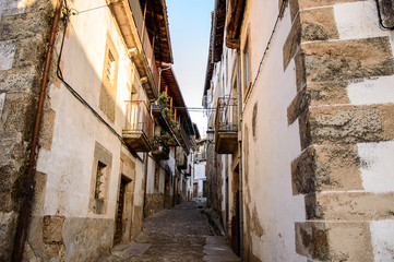 Old houses in a street of a village