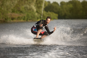 Wake bord rider having the fun