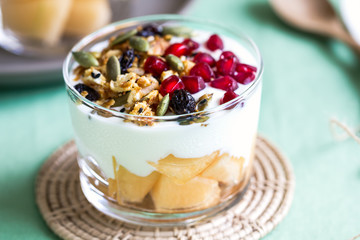 Granola with Greek yougurt and Cantaloupe