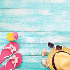 Summer vacation. Pink sandals by swimming pool.