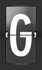Letter G on a mechanical timetable