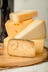 Assorted Cheese Plate with Red Wine, Nuts and Honey