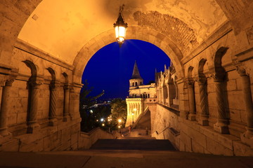 The north gate of the Fisherman's Bastion in Budapest, Hungary at night
