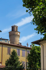 Clock tower and capenters on roof
