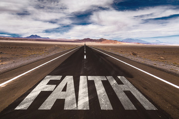 Faith written on desert road