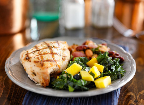 grilled chicken with mango kale salad
