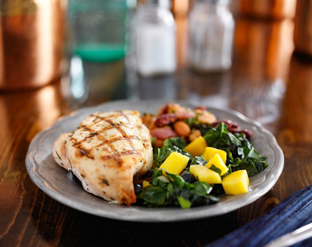 grilled chicken with mango kale salad