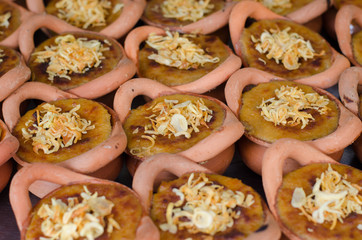 Thai dessert in clay pots,Mung Bean Thai Custard Dessert at floa
