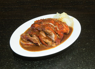 Delicious Roast Duck on stone background