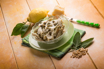 pasta with pesto sauce and parmesan flake