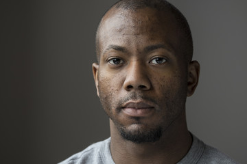 Studio portrait of an African American man - Powered by Adobe