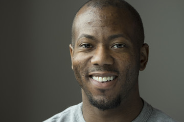 Studio portrait of an African American man smiling