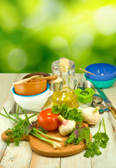  herbs and vegetables on the green background