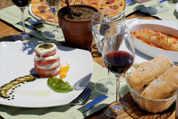 Traditional Caprese salad with mozzarella and fresh tomatoes