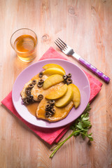 escalope with apple  and black olives