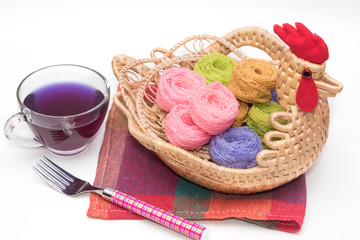 Thailand dessert in basket with butterfly pea drink on white bac