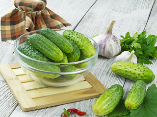 fresh cucumbers on a wooden table
