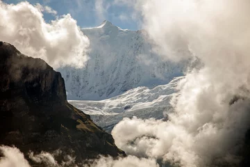 Photo sur Plexiglas Cervin Clouds, ice and snow caps on Eiger,near Grindelwald, Switzerland