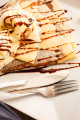 Pancake with ice cream and chocolate sauce