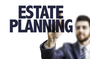 Business man pointing the text: Estate Planning