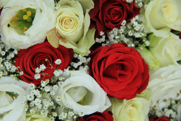 Red and white roses in a bridal bouquet