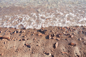 pebbles on beach sea wave