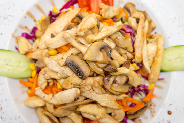 Vegetable salad with roasted chicken meat