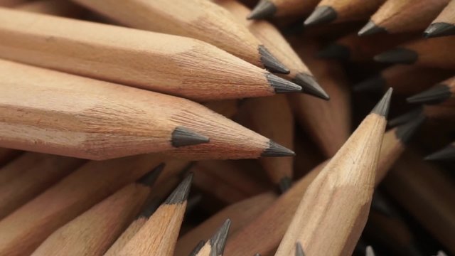 Graphite pencils in rotation
