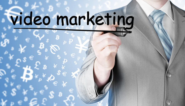 business man writing Video Marketing